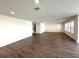 Large bonus room with wood-look flooring and lots of natural light at 16779 Broadwater Ave, Winter Garden, FL 34787
