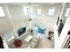 High ceiling living room with a view of the backyard at 16779 Broadwater Ave, Winter Garden, FL 34787