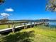 Long dock leading to a gazebo with lake access at 16779 Broadwater Ave, Winter Garden, FL 34787