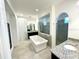 Spa-like bathroom with soaking tub and walk-in shower at 16779 Broadwater Ave, Winter Garden, FL 34787