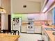 Kitchen with white cabinets and wood flooring at 252 Shady Oaks Cir, Lake Mary, FL 32746