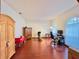 Home office features hardwood floors, built in wooden cabinet, and large window at 252 Shady Oaks Cir, Lake Mary, FL 32746