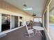 Spacious screened patio with pool view and outdoor furniture at 252 Shady Oaks Cir, Lake Mary, FL 32746