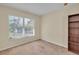 Bright bedroom with large window and built-in shelving at 2847 Metro Sevilla Dr # 105, Orlando, FL 32835
