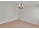 Elegant dining room with chandelier and tile flooring at 2847 Metro Sevilla Dr # 105, Orlando, FL 32835