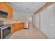 Kitchen with stainless steel appliances and wood cabinets at 2847 Metro Sevilla Dr # 105, Orlando, FL 32835