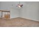 Open living area with tile flooring and breakfast bar at 2847 Metro Sevilla Dr # 105, Orlando, FL 32835
