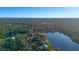 Aerial view of home and surrounding area, highlighting waterfront location at 360 Rest Haven Rd, Geneva, FL 32732