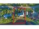 Bird's-eye view of home and property; showcasing waterfront lot and landscaping at 360 Rest Haven Rd, Geneva, FL 32732