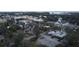 Aerial view of the property and surrounding neighborhood at 1009 Herndon St, Leesburg, FL 34748