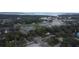 Aerial view of the property and surrounding area at 1009 Herndon St, Leesburg, FL 34748