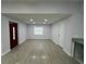 Bright living room with hardwood floors and recessed lighting at 1009 Herndon St, Leesburg, FL 34748