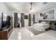 Spacious main bedroom with large TV, plush rug, and plenty of room at 1349 Castleport Rd, Winter Garden, FL 34787