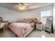 Bedroom with a large bed, a ceiling fan, and a full-length mirror at 1349 Castleport Rd, Winter Garden, FL 34787