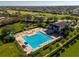 Resort-style community pool with surrounding lounge areas at 1349 Castleport Rd, Winter Garden, FL 34787