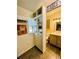 Bathroom boasts a built-in bar and updated vanity at 2025 St George Dr, Davenport, FL 33837