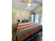 Main bedroom with king-size bed and access to a back patio at 2025 St George Dr, Davenport, FL 33837