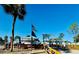 Relaxing community space with tables, umbrellas and a wooden fence at 2025 St George Dr, Davenport, FL 33837