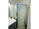 Bathroom with a glass-enclosed shower at 2025 St George Dr, Davenport, FL 33837