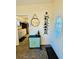 Entryway with wine rack and decorative cabinet at 2025 St George Dr, Davenport, FL 33837