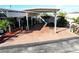Mobile home with carport and landscaped area at 2025 St George Dr, Davenport, FL 33837