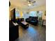 Living room with reclining sofa and flat-screen TV at 2025 St George Dr, Davenport, FL 33837