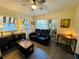 Living room with reclining sofa and coffee table at 2025 St George Dr, Davenport, FL 33837