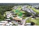 Aerial view of community with golf course and ponds at 2025 St George Dr, Davenport, FL 33837