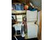 Small laundry area with stacked washer and dryer at 2025 St George Dr, Davenport, FL 33837