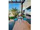 Relaxing patio with seating area and pergola at 2025 St George Dr, Davenport, FL 33837