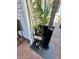 Welcoming patio decor with carved bear statue at 2025 St George Dr, Davenport, FL 33837