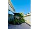 Brick paved pathway with tropical landscaping at 2025 St George Dr, Davenport, FL 33837