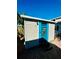 Outdoor storage shed with whimsical painted door at 2025 St George Dr, Davenport, FL 33837