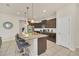 Modern kitchen with stainless steel appliances and granite countertops at 2468 Dubai St, Kissimmee, FL 34747