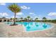 Community pool with plenty of space for relaxing at 2468 Dubai St, Kissimmee, FL 34747