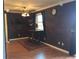 Casual dining area features a brick accent wall and wood floors at 616 Georgetown Dr # B, Casselberry, FL 32707