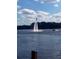 Person flyboarding on a lake under a partly cloudy sky at 616 Georgetown Dr # B, Casselberry, FL 32707