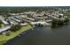 Aerial view of waterfront condos with a pool and boat docks at 616 Georgetown Dr # B, Casselberry, FL 32707