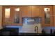 Bright kitchen boasts stylish wood cabinets and updated countertops at 616 Georgetown Dr # B, Casselberry, FL 32707