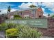 Lake Howell Arms Condominium entrance sign and landscaping at 616 Georgetown Dr # B, Casselberry, FL 32707