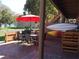 Private patio with table, chairs, and lake views at 616 Georgetown Dr # B, Casselberry, FL 32707