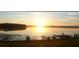 Sunrise over lake with docks and boats at 616 Georgetown Dr # B, Casselberry, FL 32707