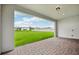 Extended patio overlooking the backyard and neighborhood at 15065 Willow Ridge Dr, Montverde, FL 34756
