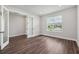 Spacious home office with hardwood floors and large window at 15065 Willow Ridge Dr, Montverde, FL 34756