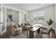 Bright office with two armchairs and a large desk at 15065 Willow Ridge Dr, Montverde, FL 34756