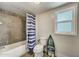Clean bathroom with shower/tub combo and stylish tile at 213 Sandy Cir, South Daytona, FL 32119