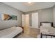 Bedroom with two twin beds, perfect for guests at 213 Sandy Cir, South Daytona, FL 32119