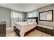 Guest bedroom with a queen-size bed and plenty of natural light at 213 Sandy Cir, South Daytona, FL 32119