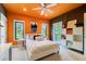 Bedroom with orange ceiling and private balcony access at 2550 Venetian Way, Winter Park, FL 32789
