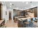 Open concept kitchen with custom cabinetry, island, and breakfast bar at 2550 Venetian Way, Winter Park, FL 32789